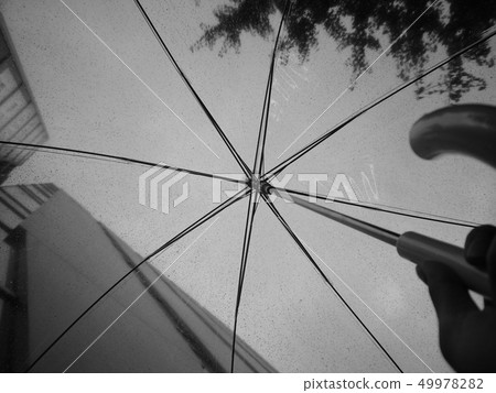 A city with umbrellas 49978282