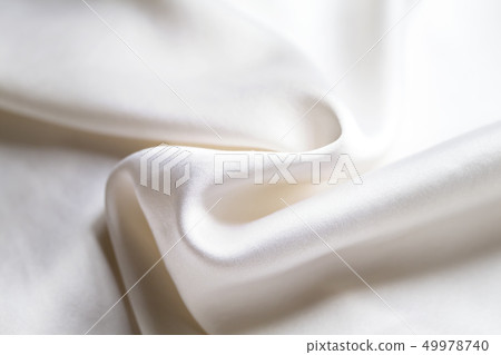 Gray beige silk material background Gray beige silk material background 49978740