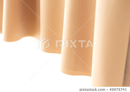 Beige orange cloth and white background Beige orange cloth and white background 49978741