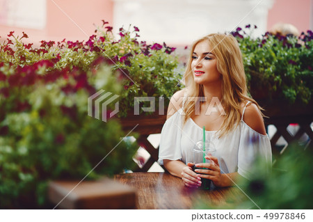 stylish blonde in a city stylish blonde in a city 49978846