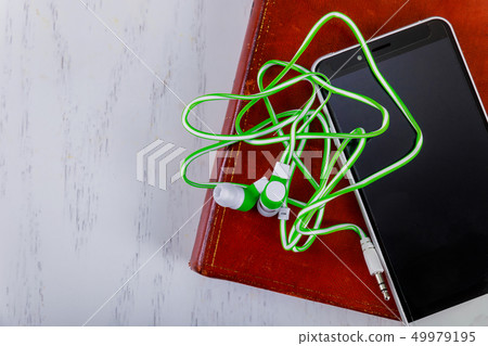 Internet ebook, smartphone, headphones on the Internet ebook, smartphone, headphones on the 49979195