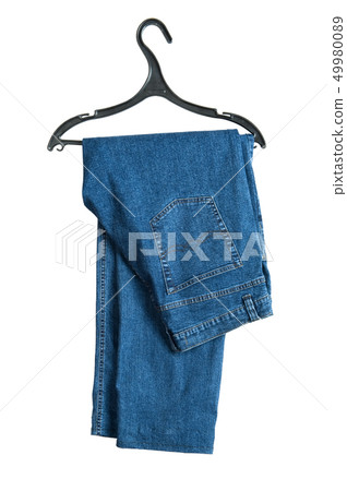 hanger with jeans on white 49980089
