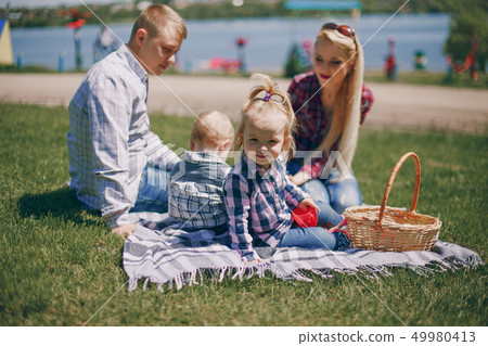 Family at a picnic Family at a picnic 49980413