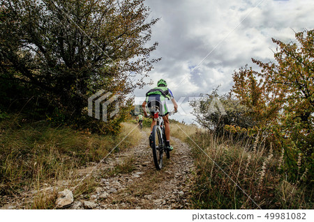 two athletes cyclists two athletes cyclists 49981082