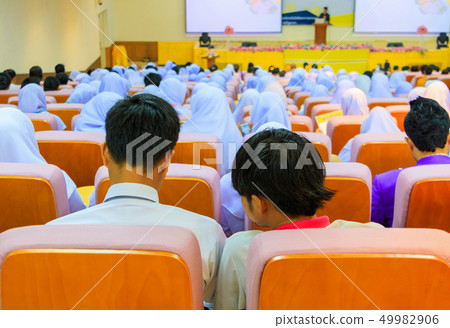 Students education sit on chair orange Students education sit on chair orange 49982906