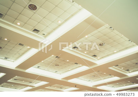 ceiling of business interior office building 49983273