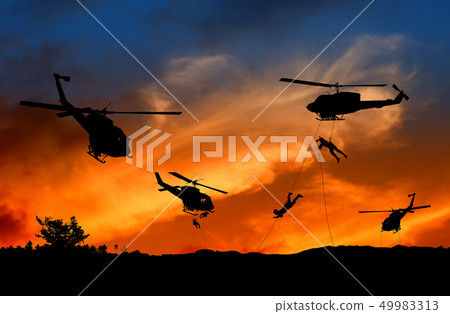 Silhouette Soldiers rappel down to attack Silhouette Soldiers rappel down to attack 49983313