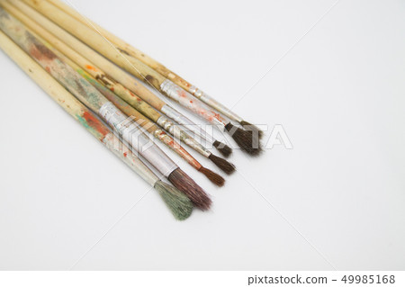 Paint brushes and paints for drawing isolated on white background Paint brushes and paints for drawing isolated on white background 49985168