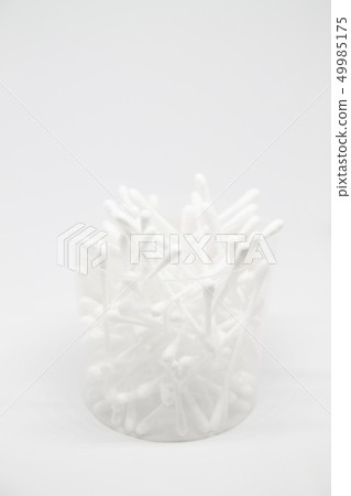 Vertical banner with cotton buds in jar isolated on the white copy space background Vertical banner with cotton buds in jar isolated on the white copy space background 49985175