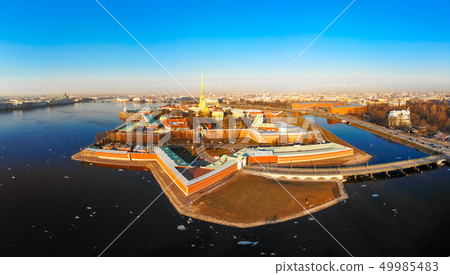 Beautifull aerial view of the Petropavlovsky fortress in sunny spring day. Golden tall spire of Beautifull aerial view of the Petropavlovsky fortress in sunny spring day. Golden tall spire of 49985483