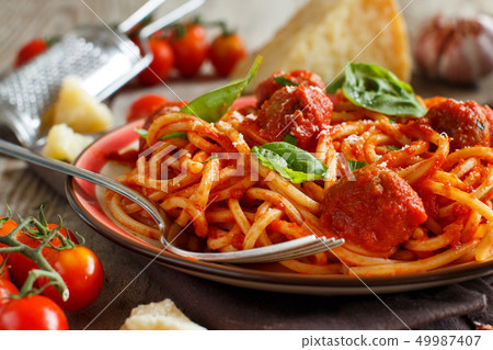 Pasta with tomato sauce and meatballs Pasta with tomato sauce and meatballs 49987407