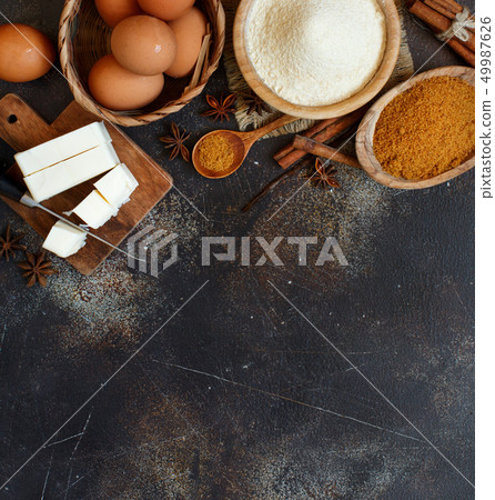 Ingredients and utensils for baking cookies Ingredients and utensils for baking cookies 49987626
