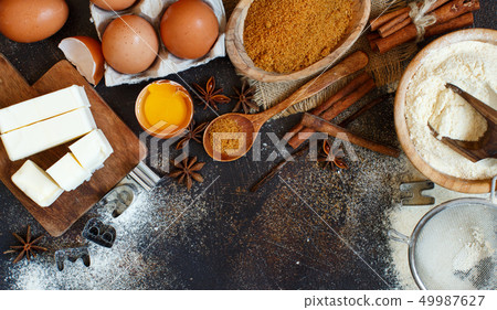 Ingredients and utensils for baking cookies Ingredients and utensils for baking cookies 49987627