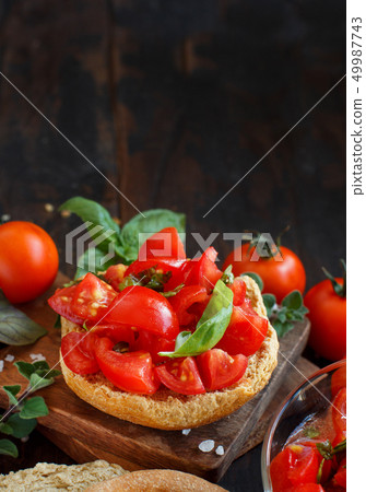 Frisella seasoned with tomatoes and herbs Frisella seasoned with tomatoes and herbs 49987743