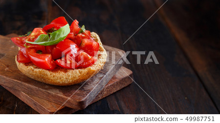 Frisella seasoned with tomatoes and herbs Frisella seasoned with tomatoes and herbs 49987751
