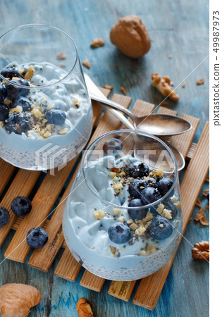 Blueberries and yogurt chia pudding parfait 49987973