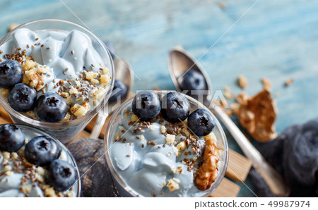 Blueberries and yogurt chia pudding parfait 49987974