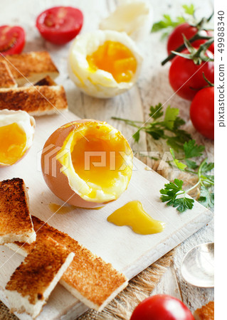 Soft-boiled egg with toasts Soft-boiled egg with toasts 49988340