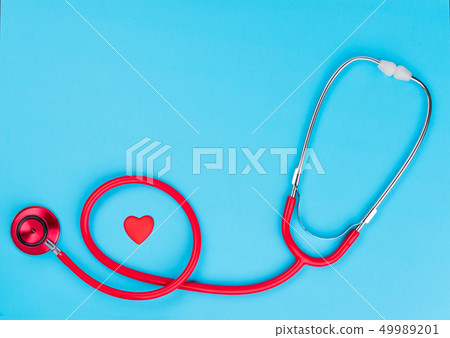 Red heart and stethoscope on on blue background. Red heart and stethoscope on on blue background. 49989201
