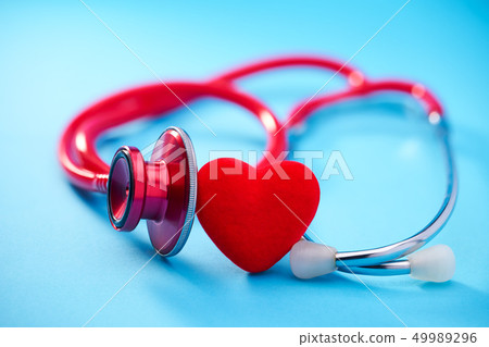 Heart and stethoscope on blue background.Selective Heart and stethoscope on blue background.Selective 49989296