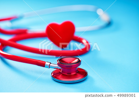 Red heart and a stethoscope or phonendoscope on Red heart and a stethoscope or phonendoscope on 49989301