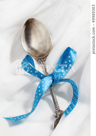 Baby spoon with bow 49989363