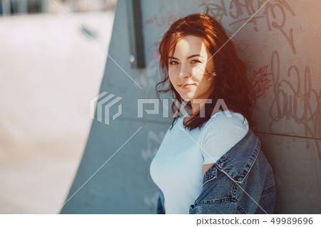 girl near wall 49989696