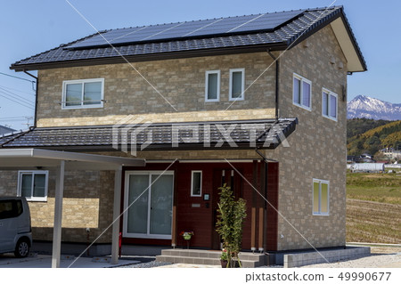 Eco house and blue sky Eco house and blue sky 49990677