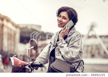 Pleasant good looking woman making a phone call 49992291