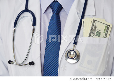 Male medicine doctor chest with bunch of hundred dollars banknotes 49993876
