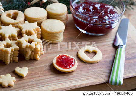 Preparation of Linzer Christmas cookies Preparation of Linzer Christmas cookies 49996409