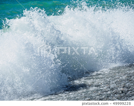 Seascape with waves and clear sky. Seascape with waves and clear sky. 49999228