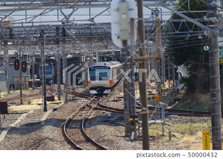 Chuo Line leaving Tachikawa Station Chuo Line leaving Tachikawa Station 50000432