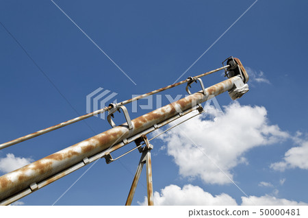 A grain elevator in the open space in a farm A grain elevator in the open space in a farm 50000481