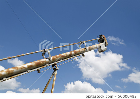 A grain elevator in the open space in a farm A grain elevator in the open space in a farm 50000482