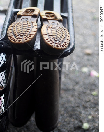 old used dirty rustic grunge black rubber boots old used dirty rustic grunge black rubber boots 50003474