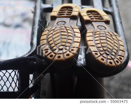 old used dirty rustic grunge black rubber boots 50003475