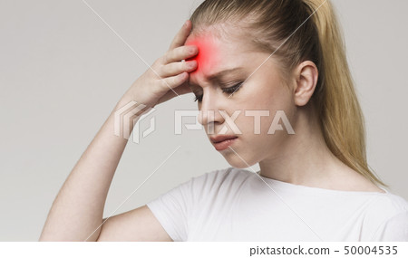 Young tired woman having mental problem trouble 50004535