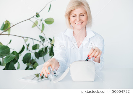 smiling aged lady beauty products choice advice smiling aged lady beauty products choice advice 50004732