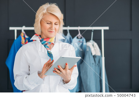 successful seniority lady tablet fashion business successful seniority lady tablet fashion business 50004743