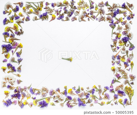 Flower frame or border of dried flowers on a white Flower frame or border of dried flowers on a white 50005395