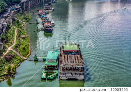 Boats along the river banks Boats along the river banks 50005493