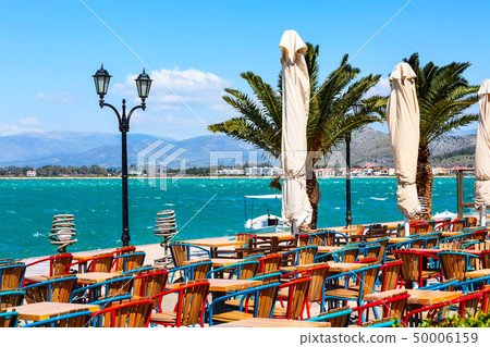 Promenade with palm trees in Nafplio, Greece 50006159