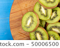 Kiwi Fruit On The Cutting Wooden Board 50006500