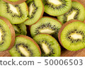Kiwi Fruit On The Cutting Wooden Board 50006503