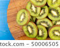 Kiwi Fruit On The Cutting Wooden Board 50006505