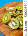 Kiwi Fruit On The Cutting Wooden Board 50006509