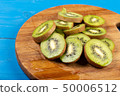 Kiwi Fruit On The Cutting Wooden Board 50006512