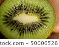 Kiwi Fruit On The Cutting Wooden Board 50006526