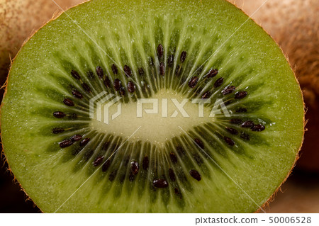 Kiwi Fruit On The Cutting Wooden Board Kiwi Fruit On The Cutting Wooden Board 50006528